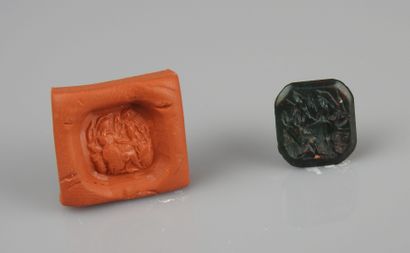 null Intaglio representing a seated helmeted goddess with a victory in front of her

Black...
