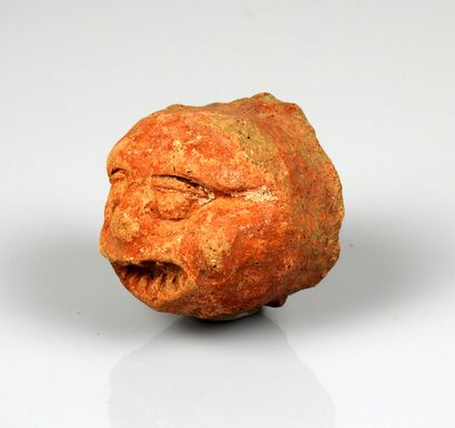 null Wall lamp representing a grimacing face

Terracotta 4.1 cm

South East Asia