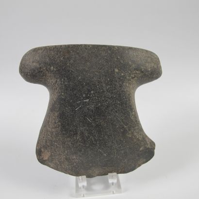 null Anthropomorphic votive polished axe with overhanging heel. Black endogenous...