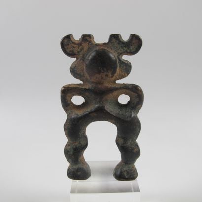null Buckle with man - deer, shamanic figure. Bronze with dark patina. H 7cm. Steppe...