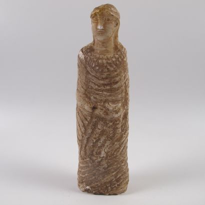 null Female statuette in long pleated dress, conical headdress, three-row pectoral...