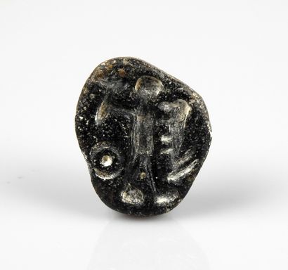 null Seal representing a man and a caprid

Glass paste 2.4 cm

Ancient Mediterranean...