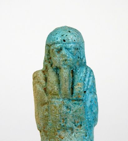 null Oushebti carrying farming tools

Blue frit 11.4 cm

Egypt Late Period XXVI-XXXth...