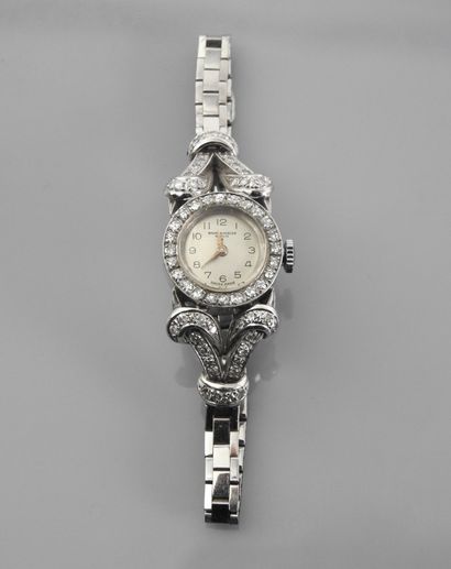 null BAUME ET MERCIER, Bracelet montre de dame en or gris, 750 MM, lunette ronde,...
