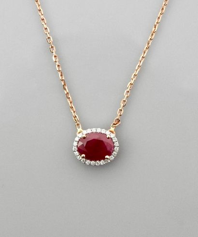 null Chain and pendant in white gold, 750 MM, centered on an oval ruby weighing 1.15...