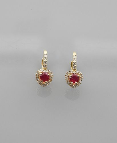 null Yellow gold sleeper, 750 MM, set with rubies and diamonds, weight: 2,4gr. g...