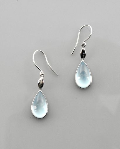 null Earrings in white gold, 750 MM, each decorated with a blue topaz cabochon, length...
