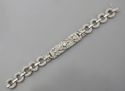 null Bracelet articulé en or gris, 750 MM, dessinant un motif recouvert de diamants...