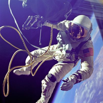 NASA Nasa. Historic Gemini IV mission. Astronaut ED WHITE with his umbilical cord...