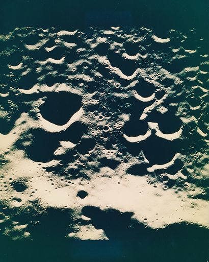 NASA Nasa. It is almost a vertical photograph of the lunar ground above the hidden...