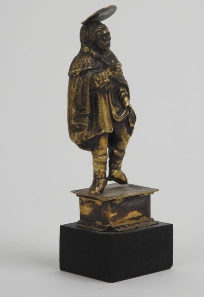 null 
Allemagne, XVIème siècle
Saint Roch
Statuette en bronze doré
H 10 cm sans le...
