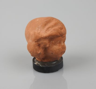 null Head of Eros Cupid.


Terracotta, Roman style.


H :3,5cm.