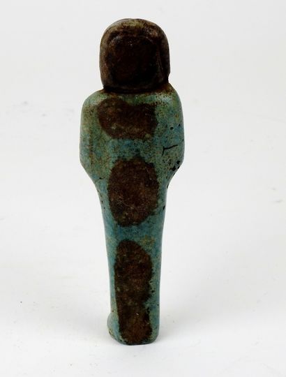 null Chaouabti representing a priest of Ptah


Frit 16 cm


Unknown period, probably...