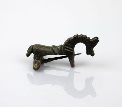 null Spring fibula representing a horse, the mane very marked


Bronze 5.4 cm


Roman...