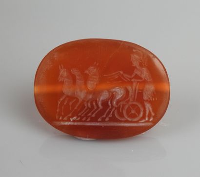 null Intaglio representing a helmeted man driving a chariot


Agate 3.3 cm


Modern...