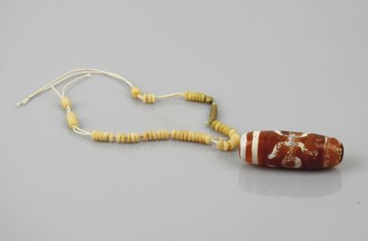null Dzi beads and others.in the state of use.L :5,5cm and other of which Tibet.