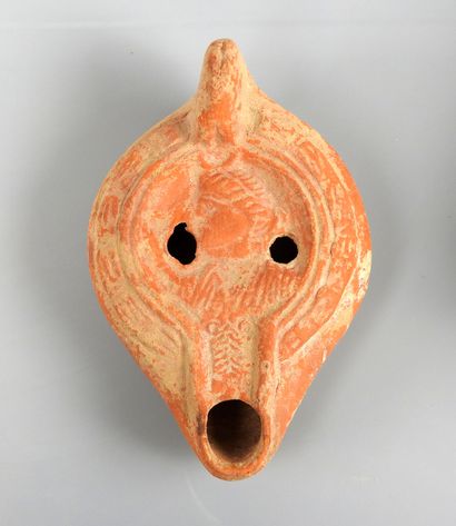null Rare oil lamp representing Luna, sister of Sol, potter's mark in the form of...