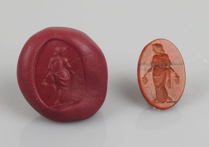 null Intaglio representing a goddess holding two bunches of grapes


Jasper 1.7 cm


Modern...