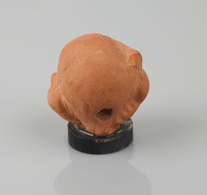 null Head of Eros Cupid.


Terracotta, Roman style.


H :3,5cm.
