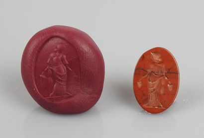 null Intaglio representing a goddess holding two bunches of grapes


Jasper 1.7 cm


Modern...