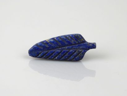 null Leaf amulet symbol of resurrection.Lapis lazuli.


2nd millennium.4 cm.