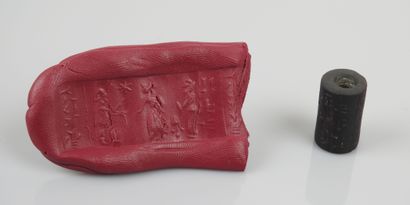 null Cylinder seal decorated with a scene of warriors between two columns of cuneiform...