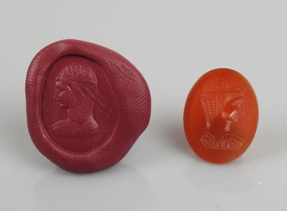 null Intaglio representing a woman wearing a bun


Agate 2 cm


Modern period