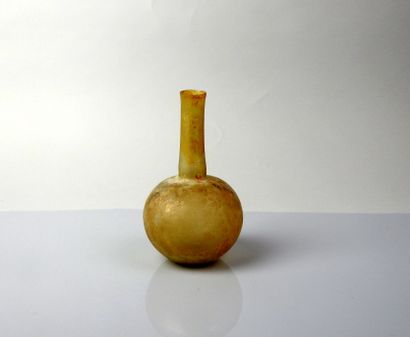 null Bottle with a long neck, yellow color


Glass 14 cm


Roman period