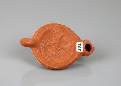 null Ancient Roman style oil lamp.Man trying to control a quadruped.


Lenv 10cm...