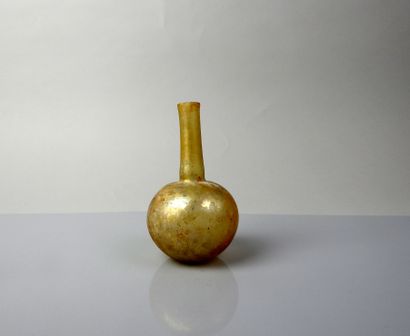 Bottle with a long neck, yellow color 
Glass...