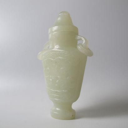 null Asia. China. Covered vase in translucent celadon serpentine evoking jade. H...