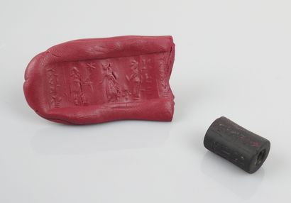 null Cylinder seal decorated with a scene of warriors between two columns of cuneiform...