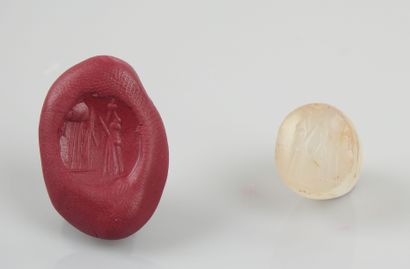 null Seal representing a scene of a stylized character in front of an altar


Chalcedony...