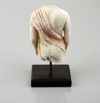 null Draped male acephalous body.stucco or other with remains of polychrome.greek...
