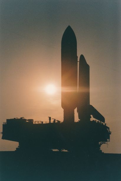 null Nasa. Majestic silhouette of Space Shuttle Atlantis (Mission STS-84) caught...