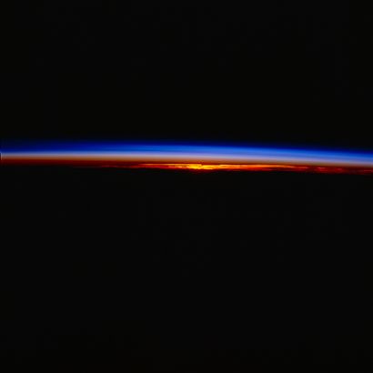 null NASA. LARGE FORMAT. Rare observation of a sunset from space orbit aboard the...