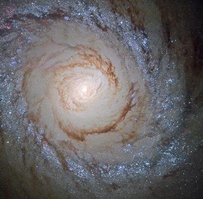 null NASA. HUBBLE. Impressive top view of a galaxy located 15 million light years...
