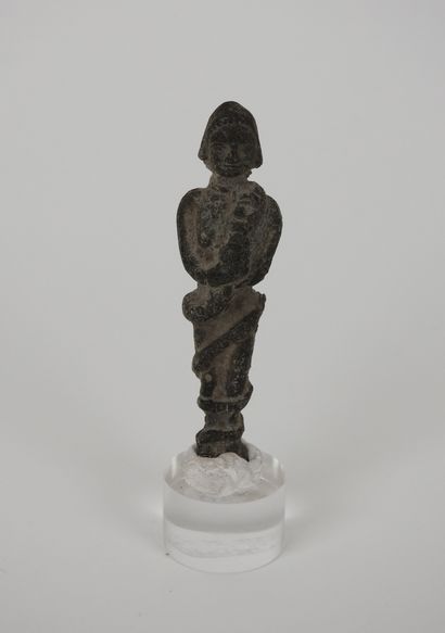 null Votive statuette.Lead.

Woman with a snake around her.1st mullennium B.C.Orient.H...