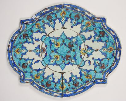 null Kuthaya polychrome terracotta table top.end of 19ès.composed of nine tiles.