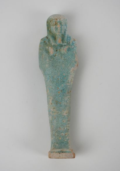 null Large oushebti

inscribed.turquoise frit altered.

As is.H :18cm.

Late Period.365-35...