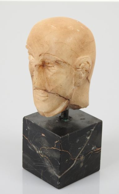 null Alabaster head with inscribed eyes and a fine chiseled beard signifying his...