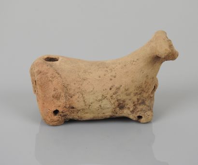null Bull on wheels (missing) toy of child.

Terracotta.Hittite art, approx. 3rd-2nd...