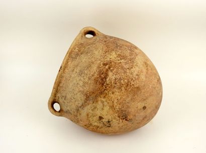 null Amphora of ovoid form

Terracotta 31 cm

Roman period