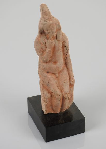 null Statuette of Harpocrates seated with finger on the chin.

Terracotta from the...