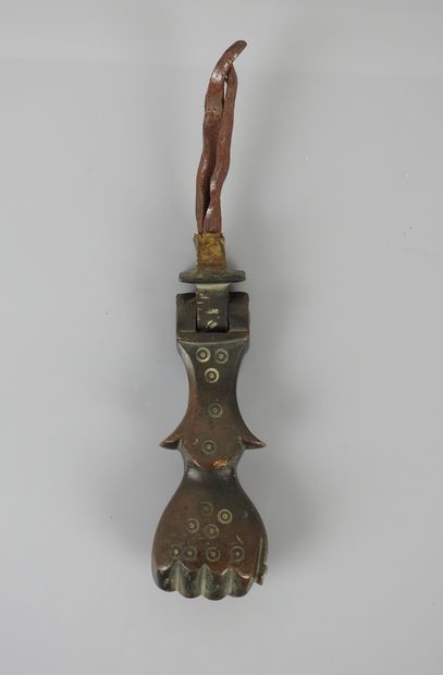 null Door knocker.hand or paw with ocelli holding a symbolic globe.bronze.romanobyzantine...