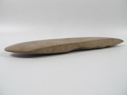 null Large votive polished axe with flat edges and double cutting edge. Beige stone...