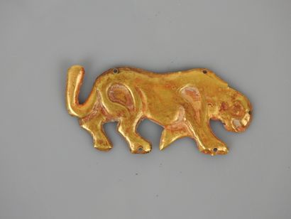 Feline.embossed gold.ornament that was probably...