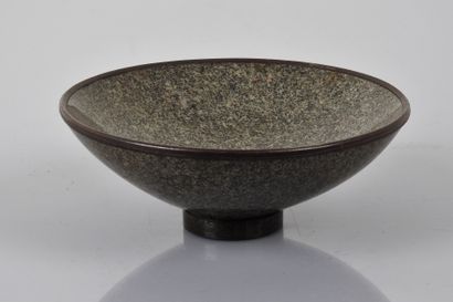 Probably antique granite pedestal bowl.

Later...