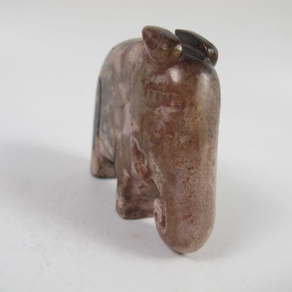 null Statuette of stylized elephant in jade. Beige nephrite with patina, wear. L...