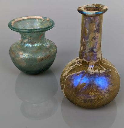 null Two glassware : Balsamaire with straight neck and globular body.iridescent glass...